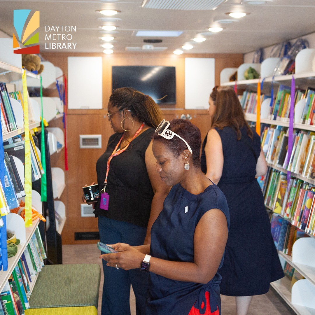Patrons peruse the shelves in Dayton Metro Library's new Bookmobile.