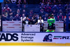 Trisha Good, Patrick Burke and his family and Stinger waves to the crowd at the 2024 CBJ College Savings Award check presentation