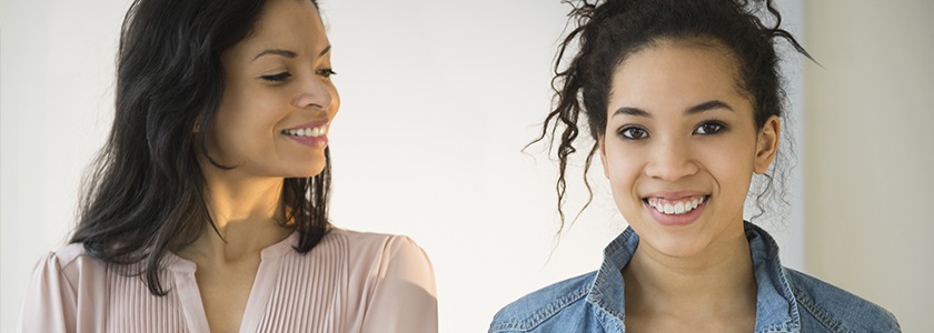 How To Ask For More Financial Aid Mom smiling at teenaged daughter