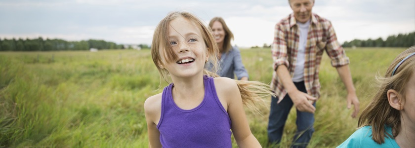 Aug. 24 Webinar Shares How To Help Your Middle Schooler Thrive Family walking through open field