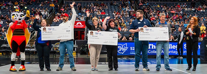 Columbus Fury mascot Lumi stands with 2026 Columbus Fury College Savings Ace, State Educator of the Year, and Educator Night Winners