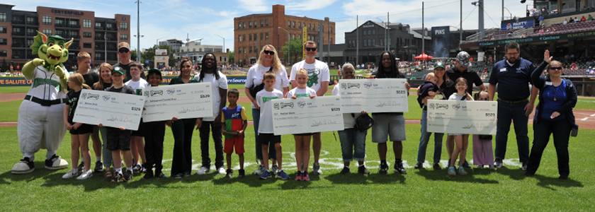 Dayton Dragons MVP Student Winners on-field check presentation