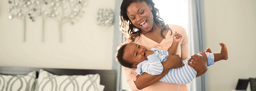 New Age-Based Fund Added To Ohio’s 529 Plan Mother swinging her baby in her arms