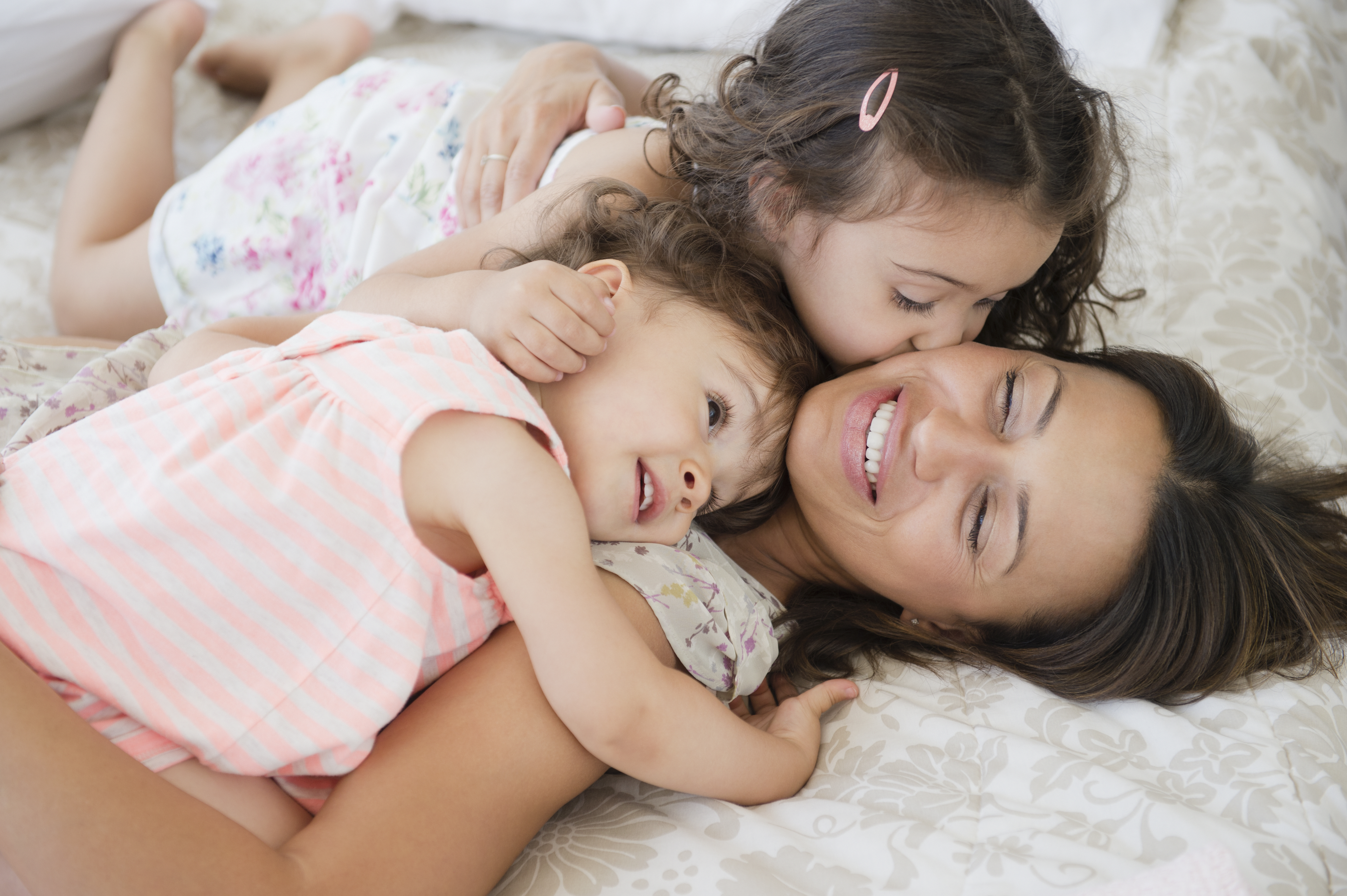 Image of mother and 2 toddler-age daughters